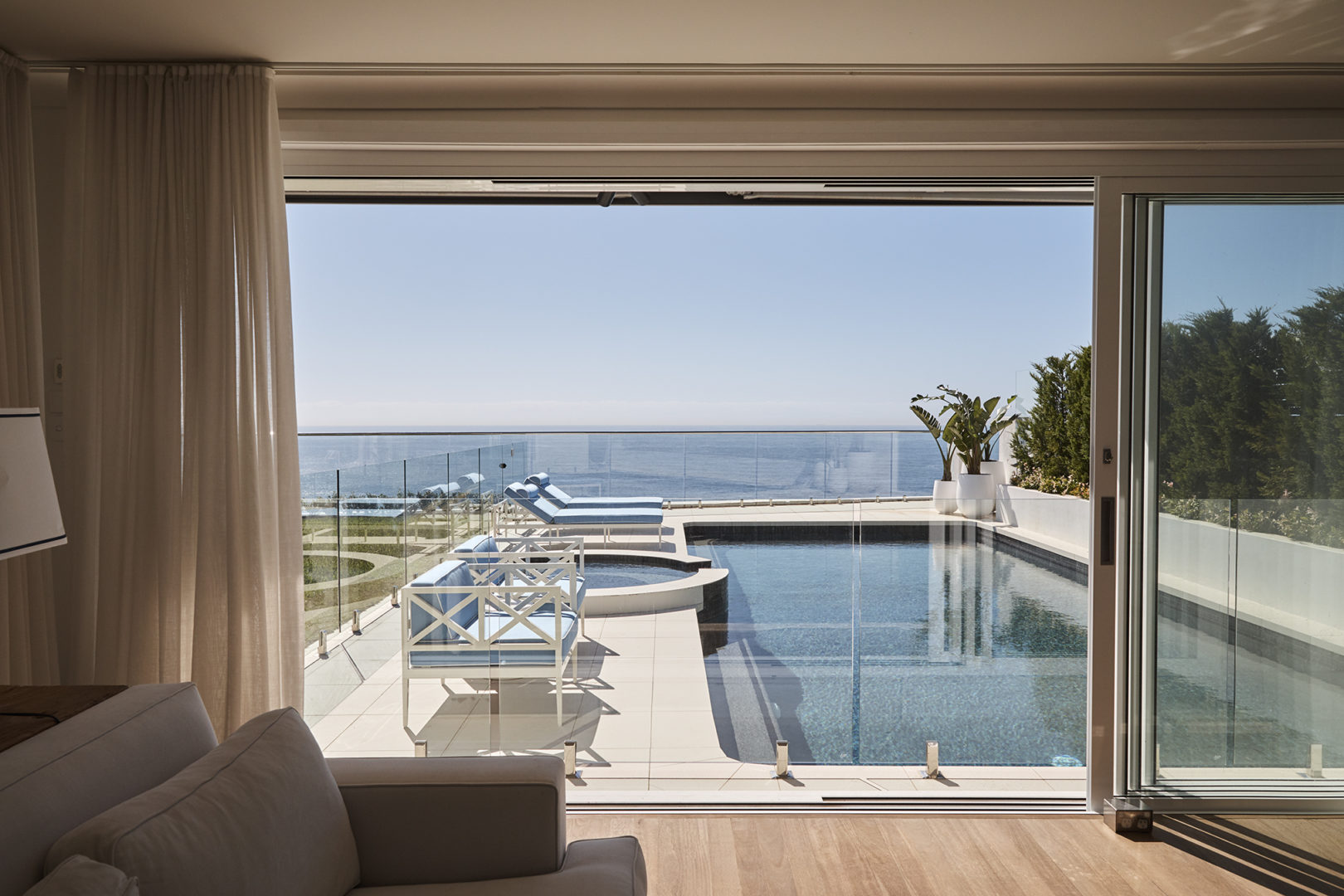 Swimming Pool and Jacuzzi, view from living room with scenery over Pacific Ocean