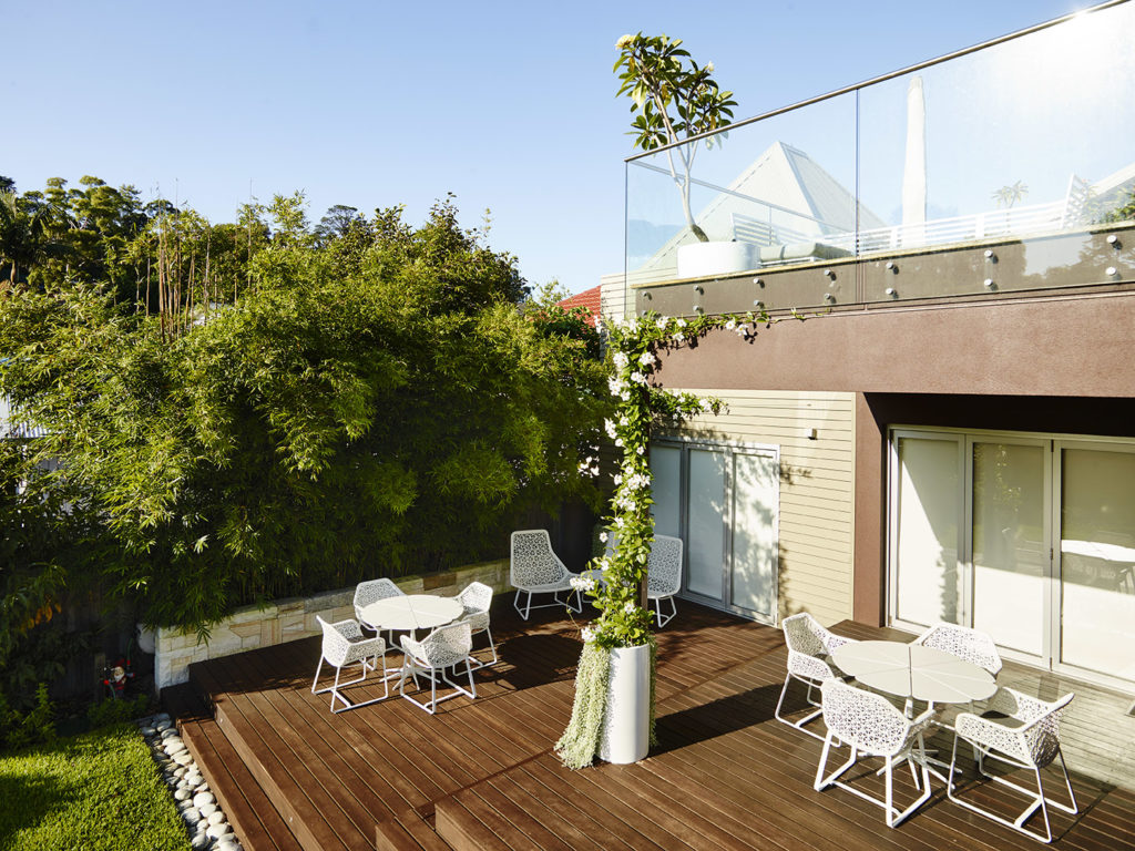 Think Outside Gardens - Backyard seating outside